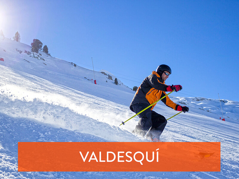 Skiing, winter, ski lesson - skiers on mountainside Skicenter Valdesquí: clase privada de esquí de 3h y alquiler de material para 2 personas